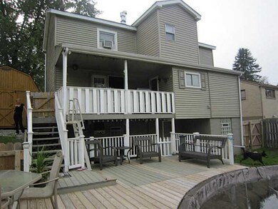 Exterior Back. View of the back of the house and d