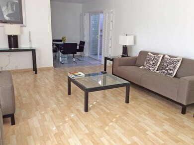 Living room, into dining area, kitchen