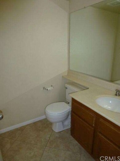Convenient downstairs half-bath.
