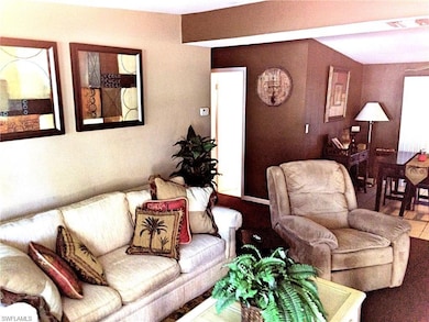 Living room (tile floor has an area rug)
