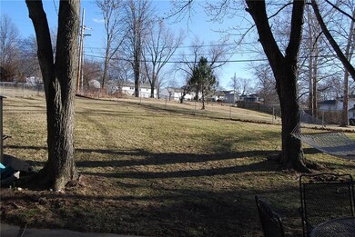 View from the patio treed fenced yard.