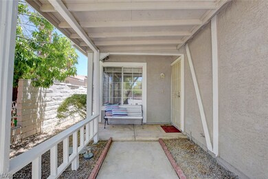Welcome your guests to a charming front porch entr