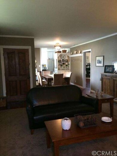 View of dining room and front door from living roo