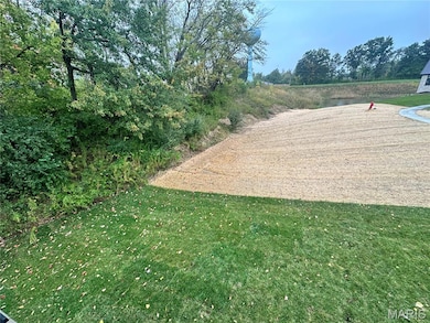View of community featuring view of wooded area