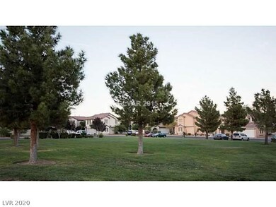 Community park surrounded by guest parking