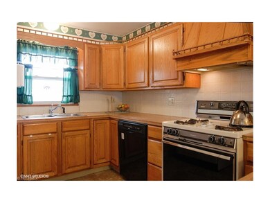 Spacious kitchen with oak cabinets and plenty of c