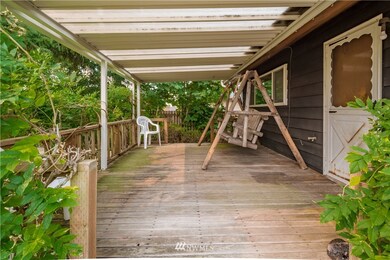 The back deck is covered and a very nice area to relax or entertain.