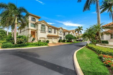 View of front facade featuring stucco siding, a residential view, an attached garage, a tiled roof, and asphalt driveway