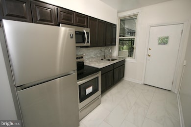 111 S Kossuth St, Baltimore, MD 21229 - photo 5