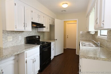 Updated kitchen with new appliances, counters, flo
