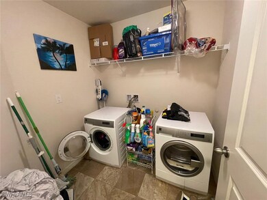 Clothes washing area featuring separate washer and