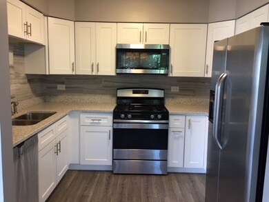 New cabinets, granite countertop, backsplash, micr