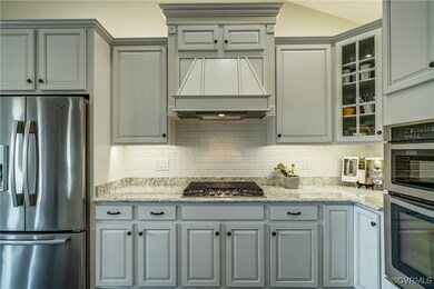 Kitchen featuring appliances with stainless steel