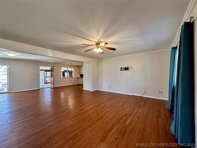 OPEN CONCEPT LIVING AND DINING AREA