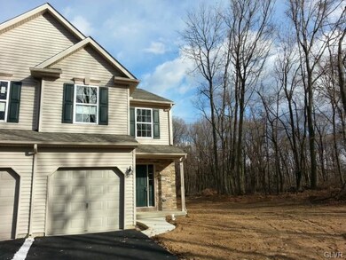 Front view with privacy woods on right