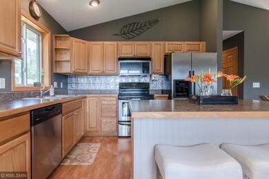 Notice the stainless steel appliances and updated 
