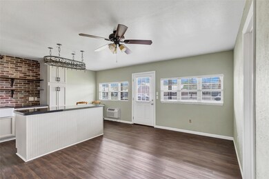 This room features a cozy open-plan design with a