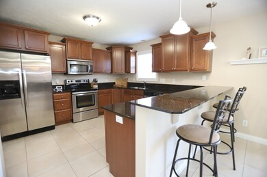 Lots of Walnut Cabinets, Granite Countertops and B