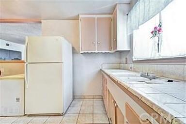 Another view of the kitchen.