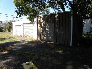 3 garages in rear of the property.