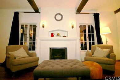 Original sconce lighting and display cove above fi