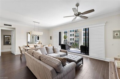 Living area with visible vents, ceiling fan with n