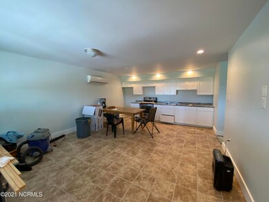 7 Open living room to kitchen area