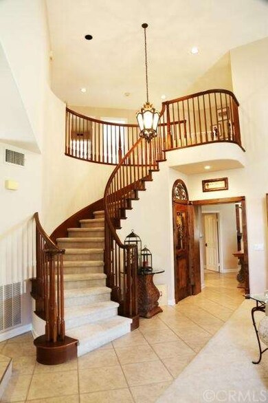 Dramatic Solid Wood Curved Staircase with Custom W