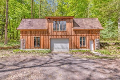3 CAR GARAGE WITH 2ND FLOOR WORKSHOP - HEATED