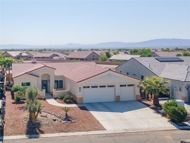 View of front of property with a mountain view and