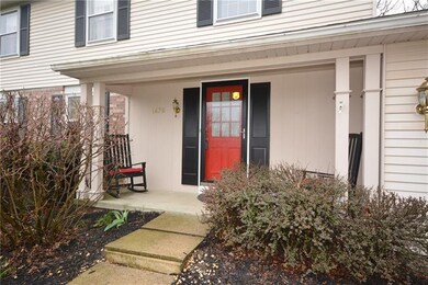 The welcoming front porch is the perfect place to 