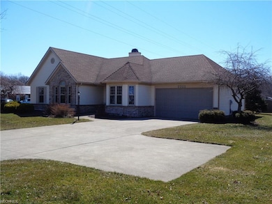 Attached heated garage, wide driveway w/turn aroun