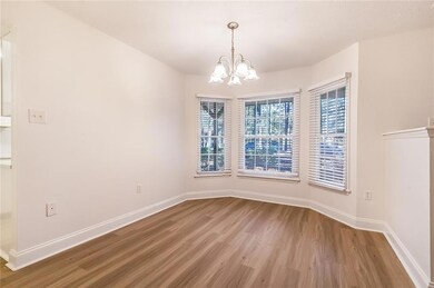 Bay window adds character to the dining area.  Upd