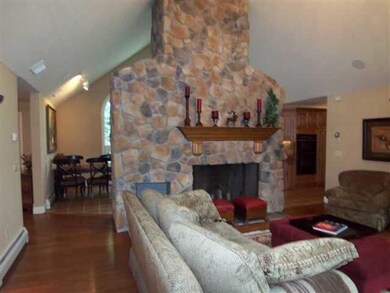 Other STONE FIREPLACE IS THE CENTRAL FOCAL POINT B