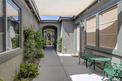 Property entrance featuring stucco siding