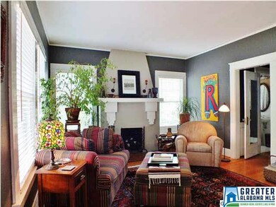 Cozy living room with a wood burning fireplace