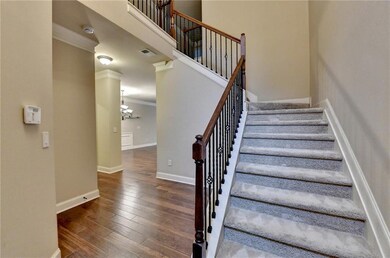 Stairway with visible vents, hardwood / wood-style