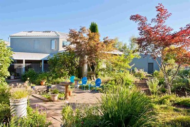 The home is surrounded by the gardens and stunning
