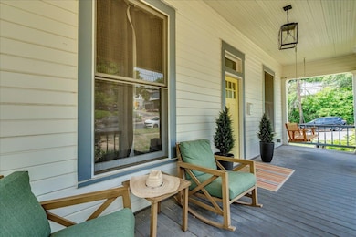 Deck featuring covered porch