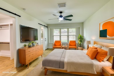 Primary bedroom with en suite and large walk in closet