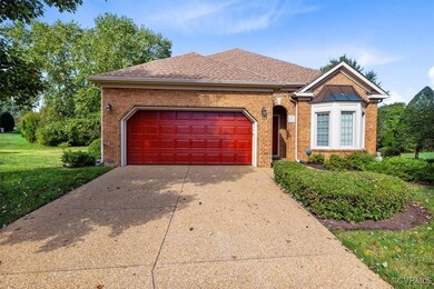 Two car garage, aggregate driveway and front entry