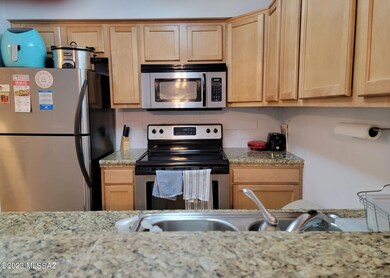 Kitchen on the left of the entryway