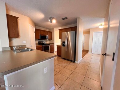 10669 Academy Park Dr, Jacksonville, FL 32218 - photo 7