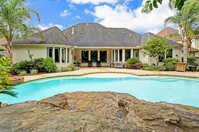 View of the rear elevation across the pool.