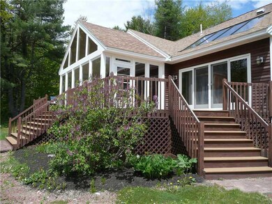 Exterior Back. and lilacs in the spring