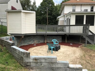 Fire pit area,enormous  deck, 3 season room and a 