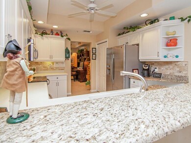 The remodeled kitchen includes expansive granite c