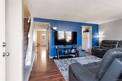 Home opens to a large, well lighted, living area.