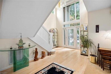 Beautiful entry way with abundance of natural light throughout.
