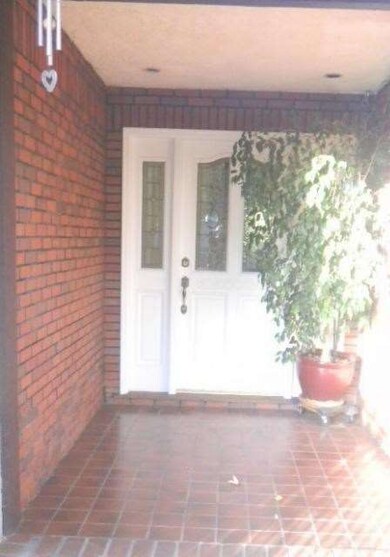 Lovely Brick and Tile Front Entry.